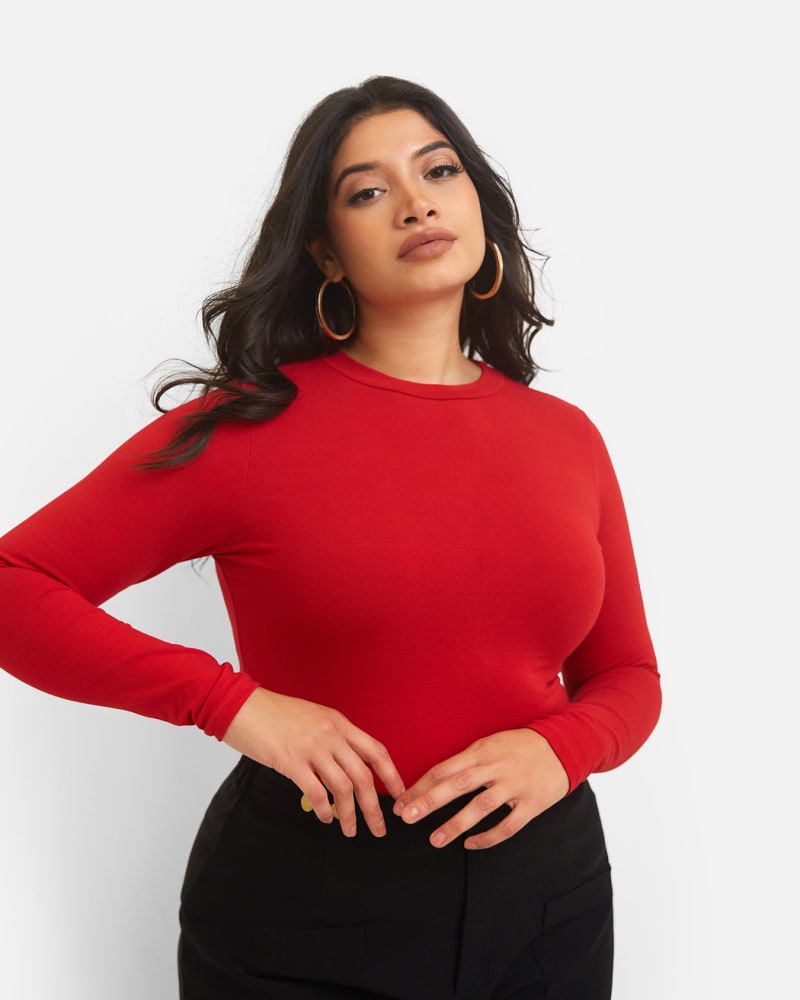Side of a model wearing a size L Essential Long Sleeve Crew Neck Top - Red in Red by Rebdolls. | dia_product_style_image_id:321223